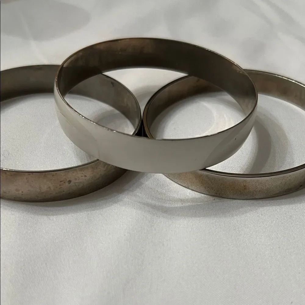 Set of three Vintage enamel and metal bracelets GVC some scratches on white one
